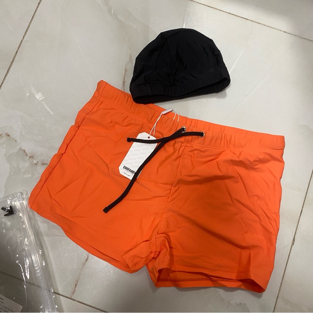 NWT MALE Orange Swim Shorts with Black Cap